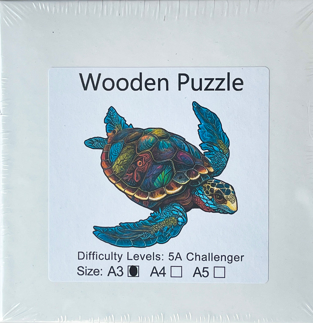 Puzzle A3 en bois laminé dans une boîte cartonnée avec sac de transport et reproduction. Pièces irrégulières uniques rendant l'assemblage encore plus enrichissant, La Baleine Bleue